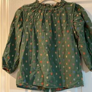 Green ruffle neckline blouse with back buttons and puff sleeve bought at Anthro